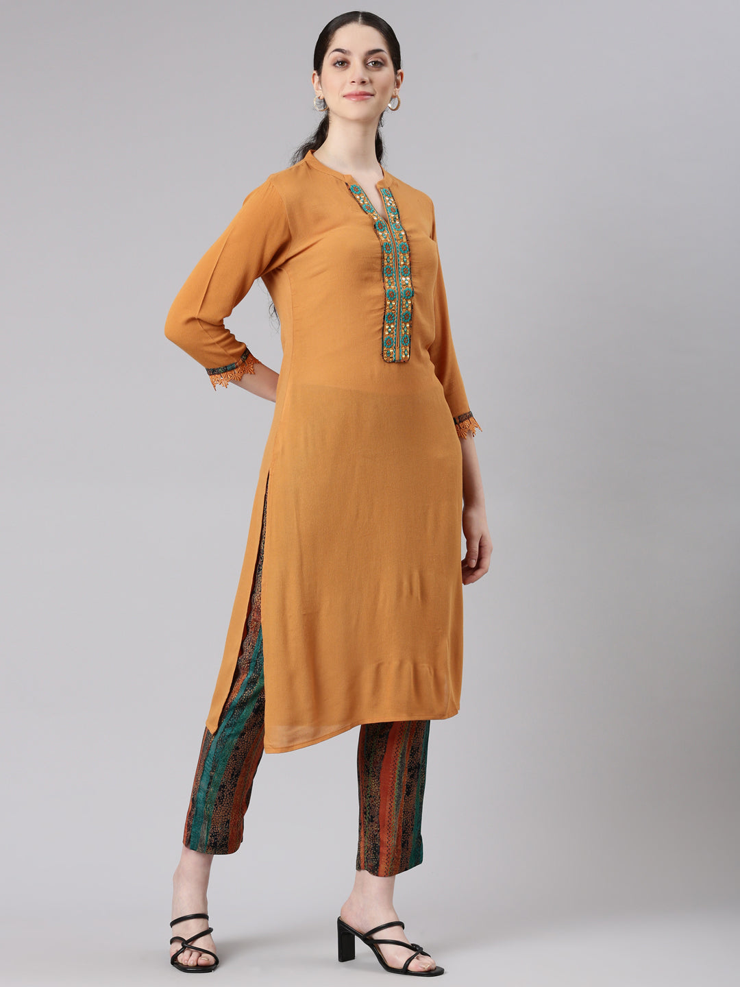 Neerus Yellow chiffon straight kurta set - back view