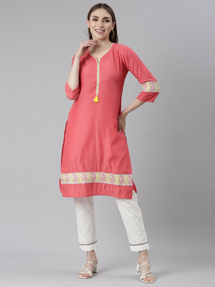 Neerus Orange rayon solid straight kurti - detail view 2