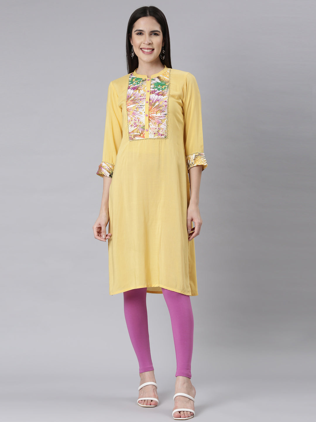 Neerus Yellow Rayon Embellished Straight Kurti - front view