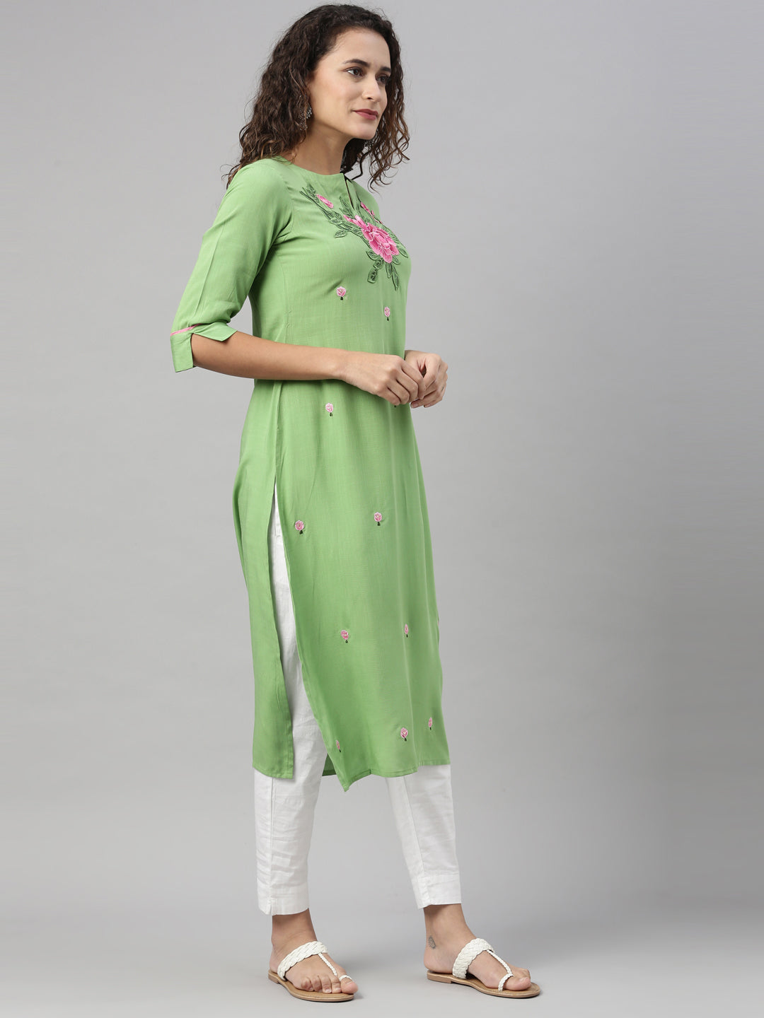 Neerus Green rayon solid straight kurta - front view