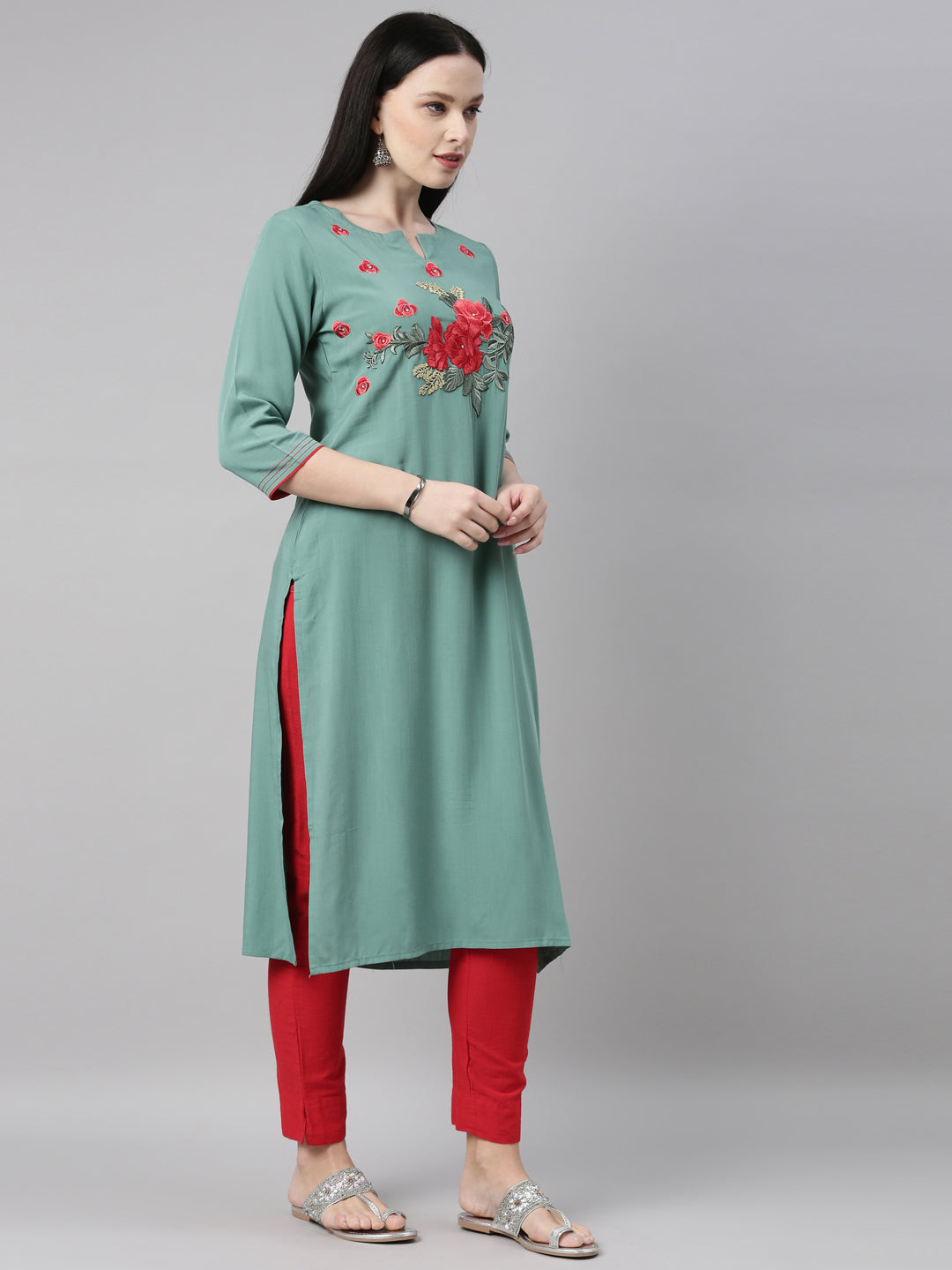 Neerus Green viscose rayon straight kurti - side view