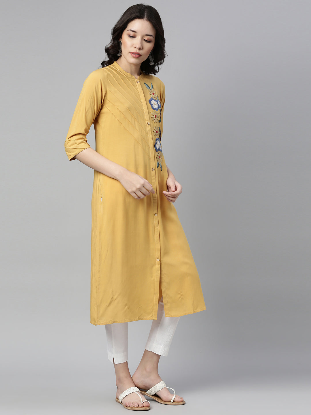 Neerus Yellow rayon embellished kurti - front view