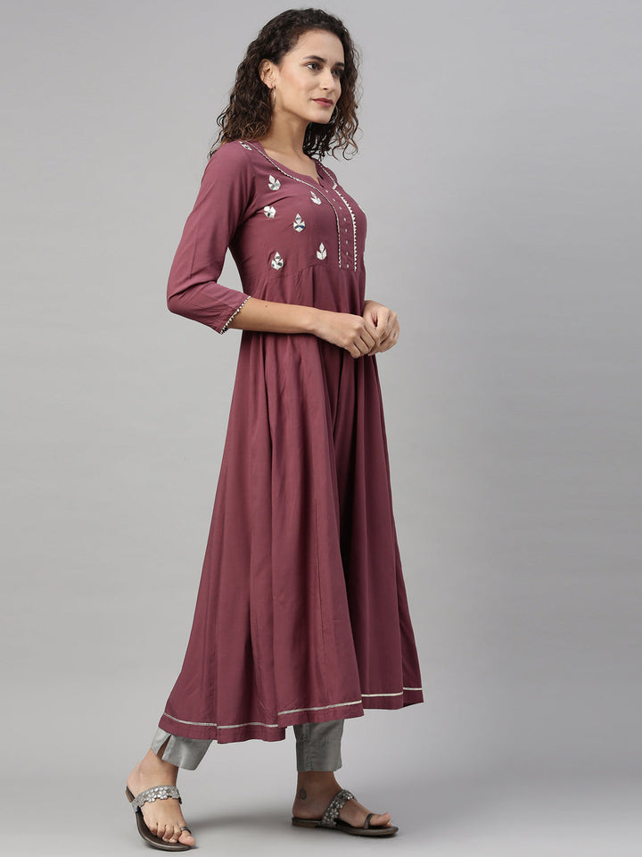 Neerus Maroon rayon mirror work kurti - front view