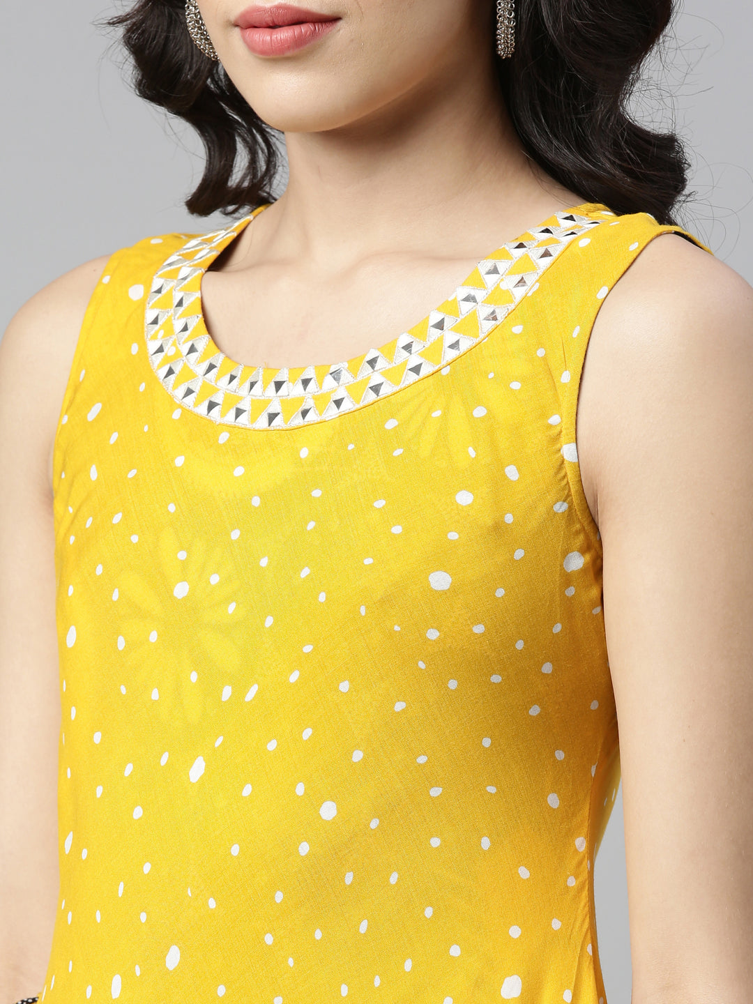 Neerus Yellow rayon mirror work A-line kurti - side view
