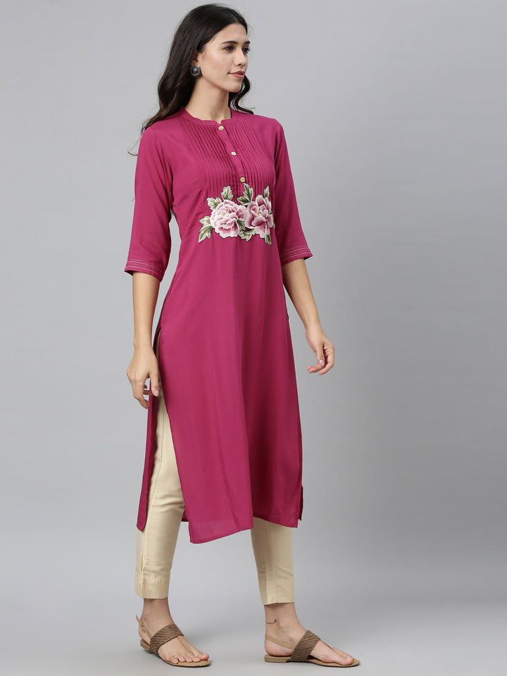 Neerus Pink viscose rayon printed straight kurti - front view