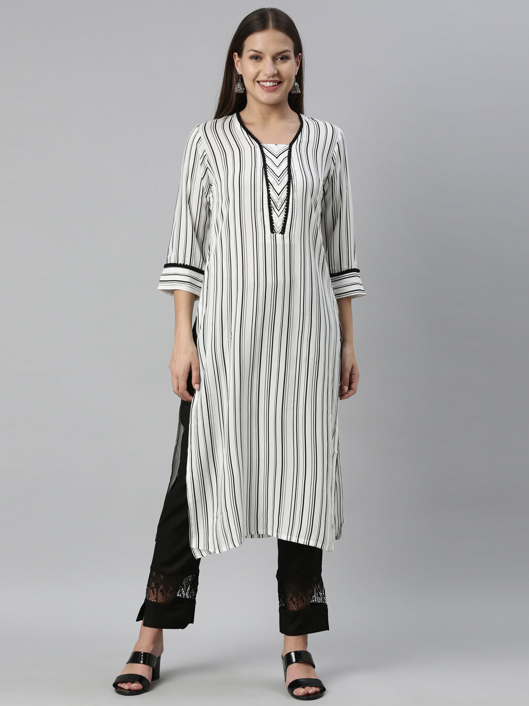 Neerus White rayon straight kurta set with palazzo - front view