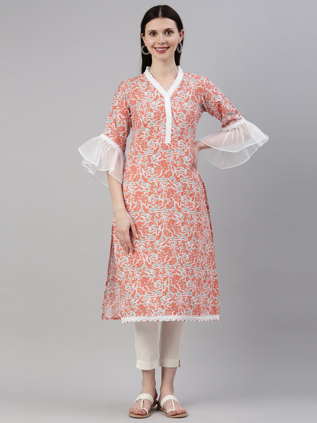 Neerus Orange rayon straight kurti - front view
