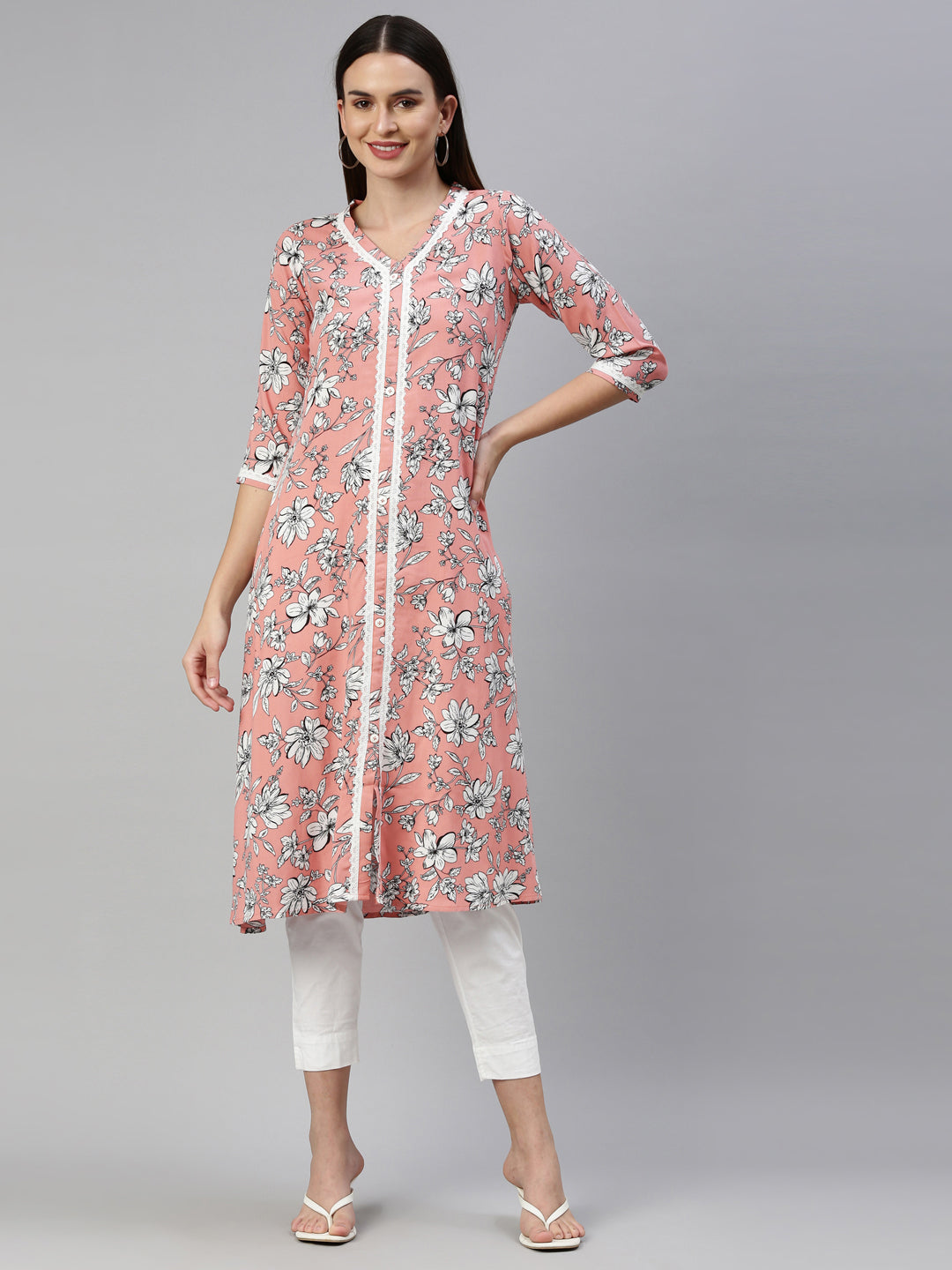 Neerus Pink viscose rayon printed A-line kurti - front view