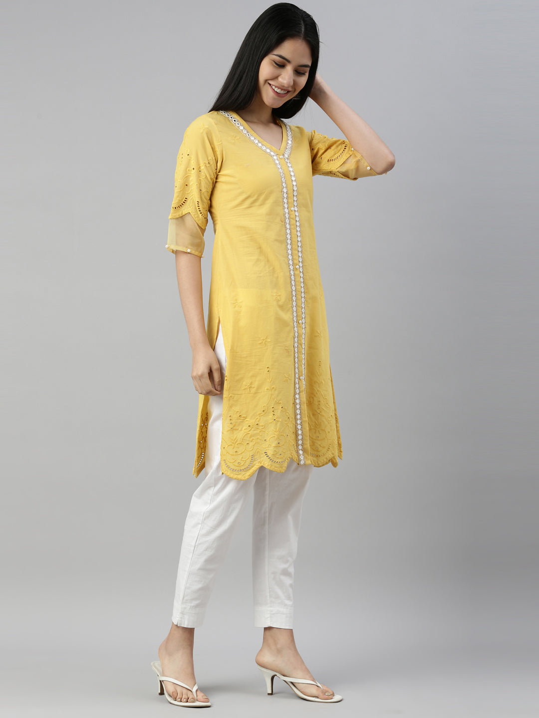 Neerus Yellow cotton mirror work kurta straight cut - side view