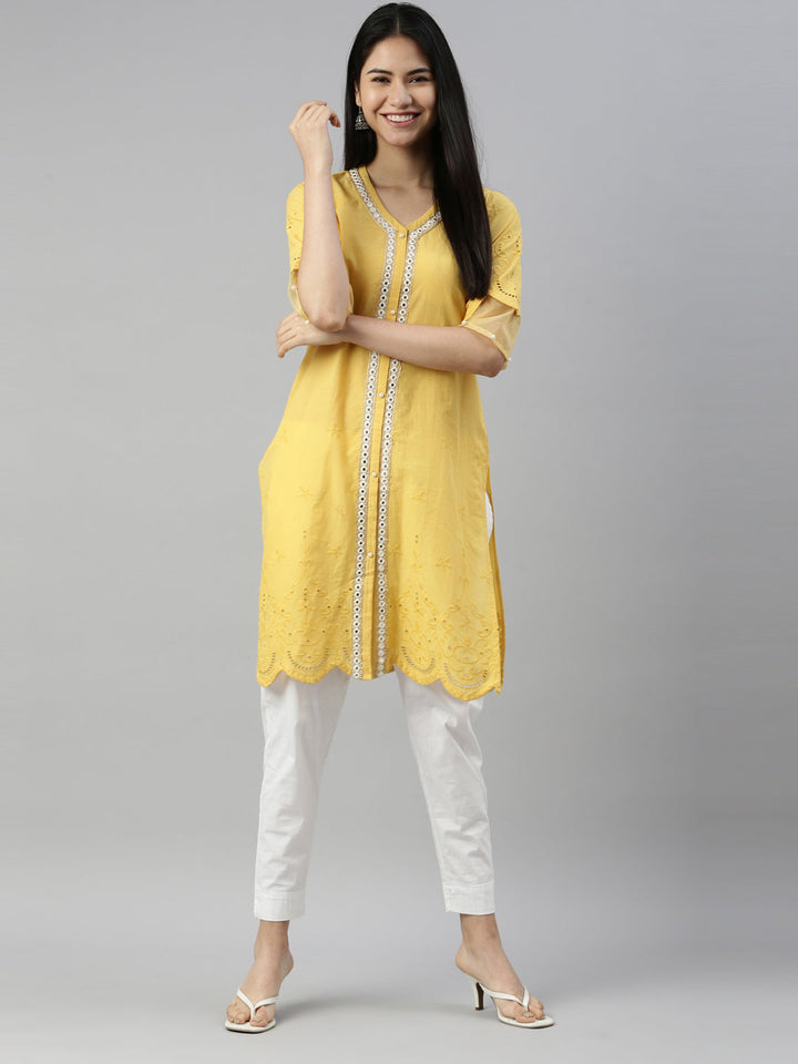 Neerus Yellow cotton mirror work kurta straight cut - front view