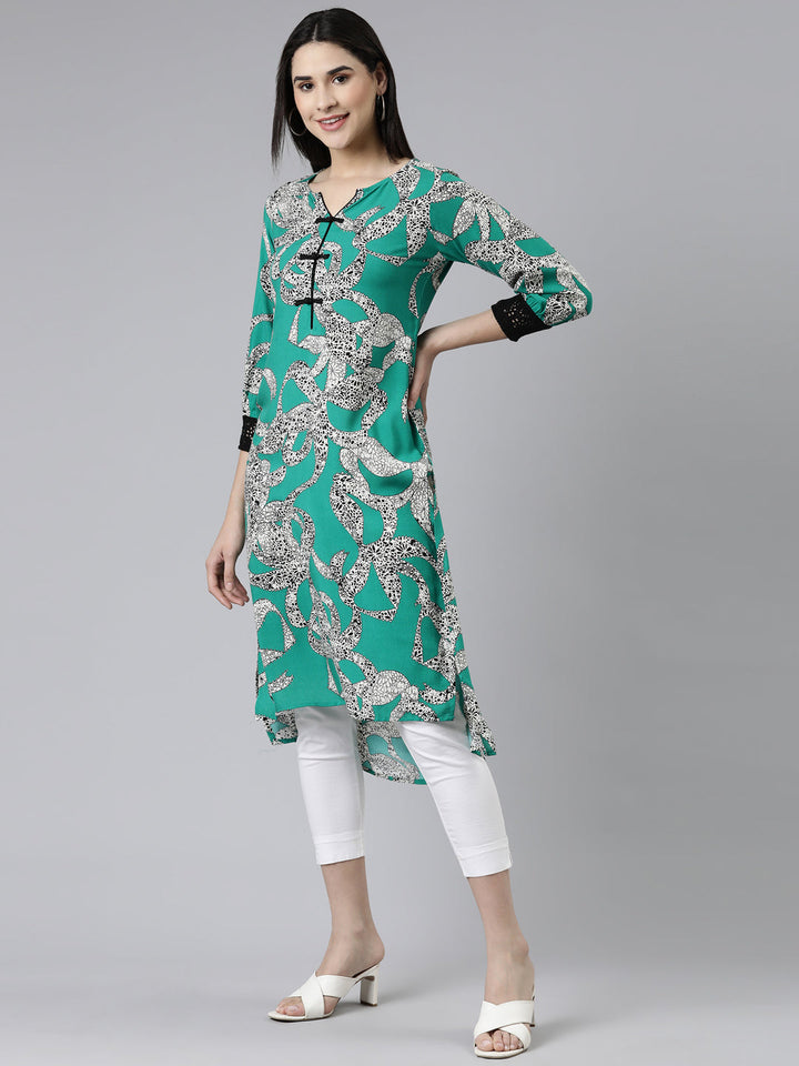Neerus Green cotton printed curved kurti - back view
