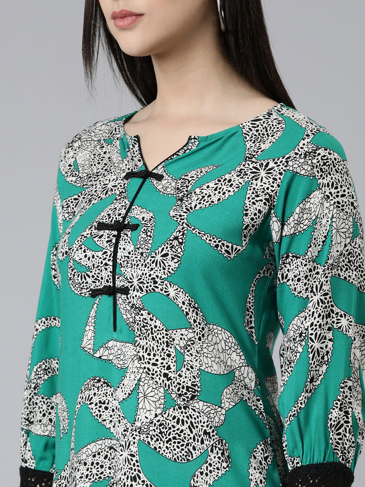 Neerus Green cotton printed curved kurti - detail view 1