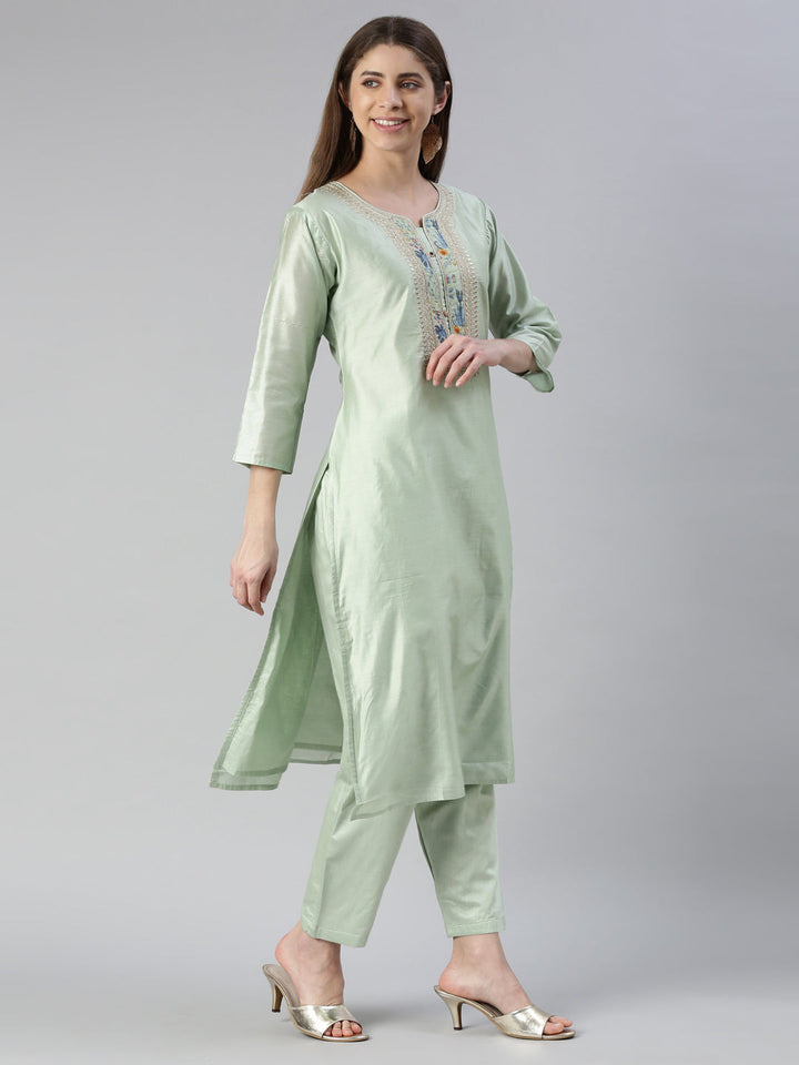 Neerus Green embroidered kurta set with trouser and dupatta - back view