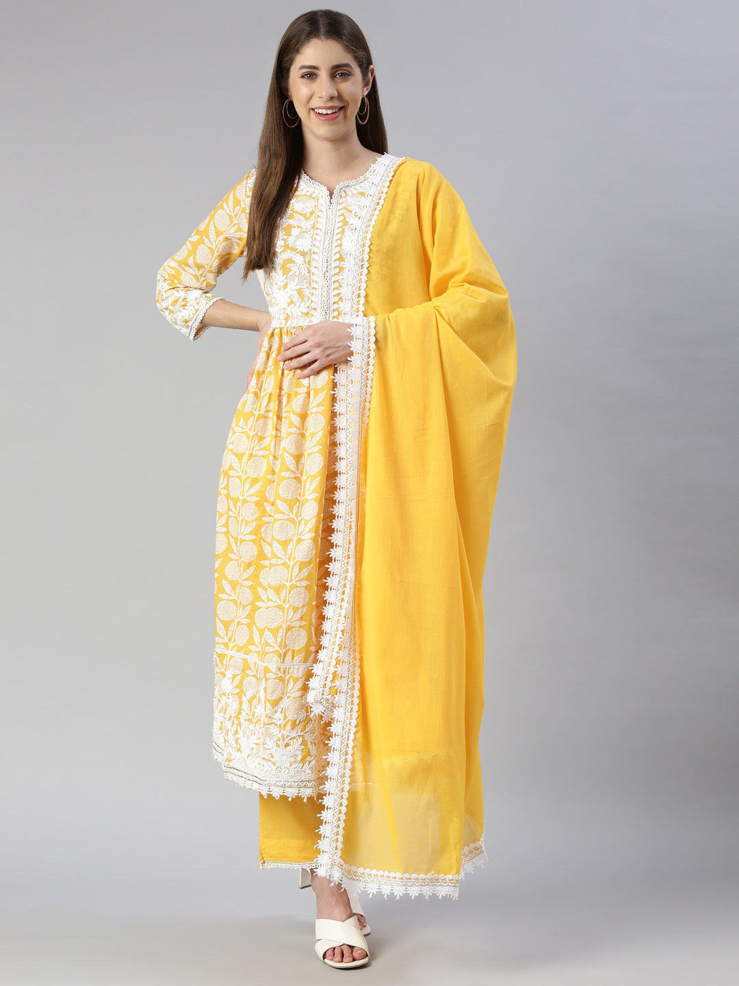 Neerus Yellow solid straight kurta set with trouser and dupatta - front view