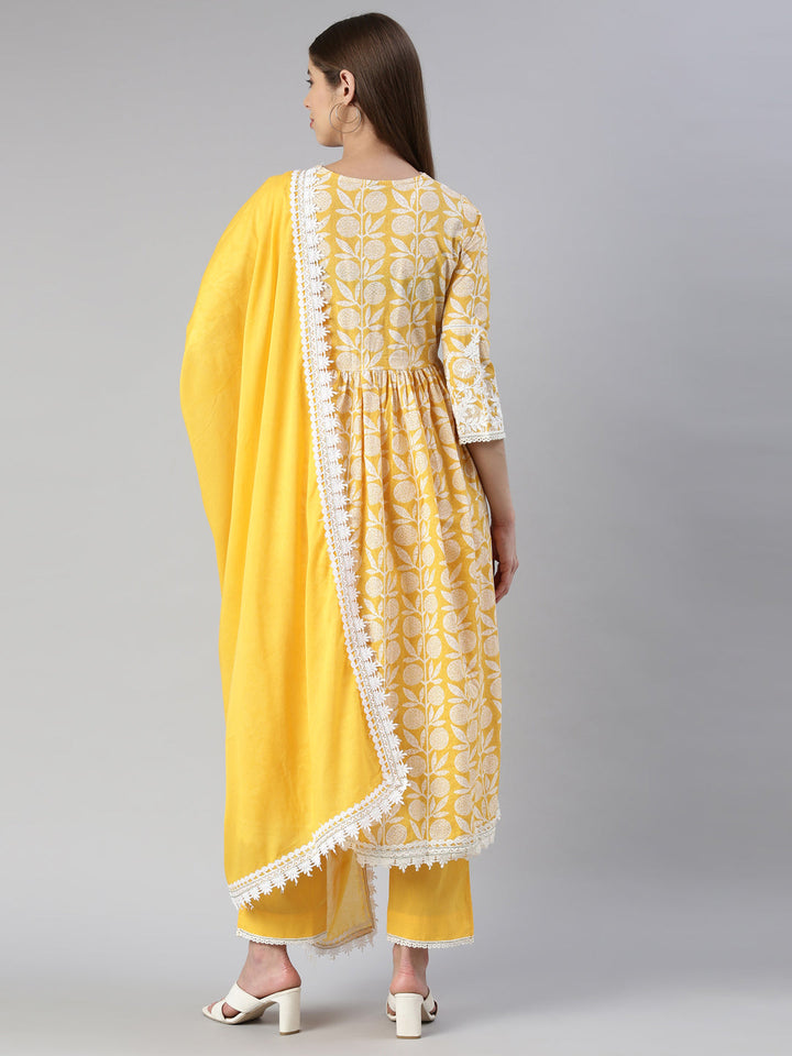 Neerus Yellow solid straight kurta set with trouser and dupatta - side view