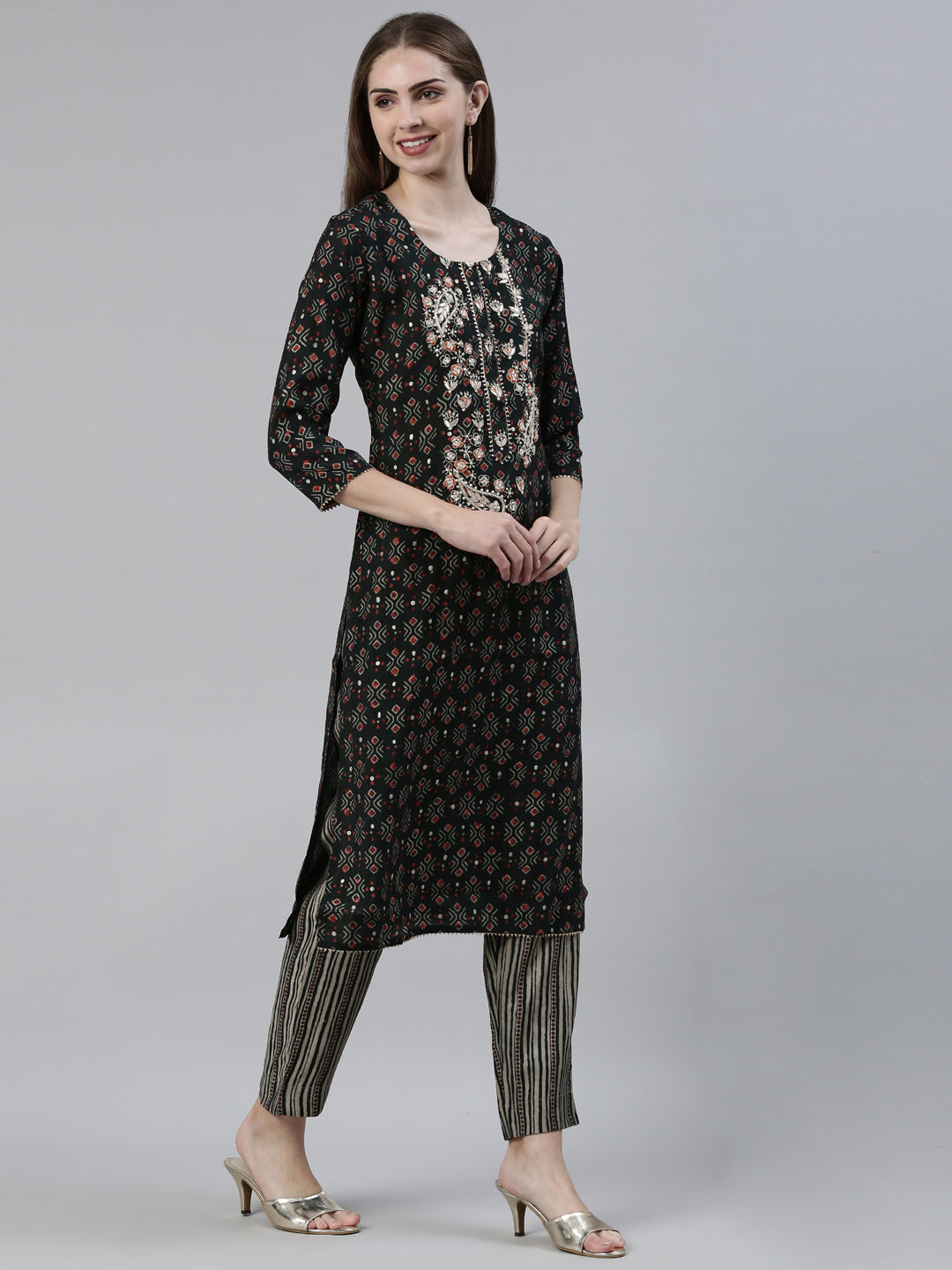 Neerus Green cotton printed kurta set with trouser and dupatta - back view