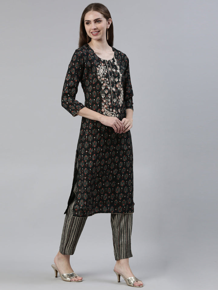 Neerus Green cotton printed kurta set with trouser and dupatta - back view