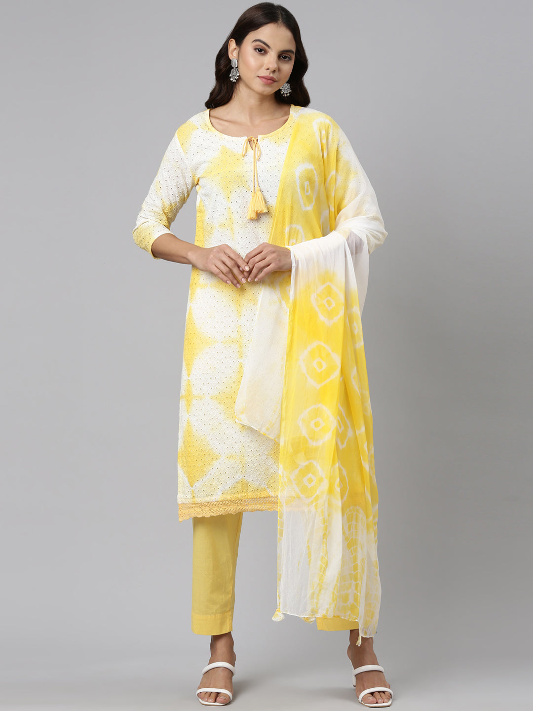 Neerus Yellow cotton solid kurta set with trouser and dupatta - front view