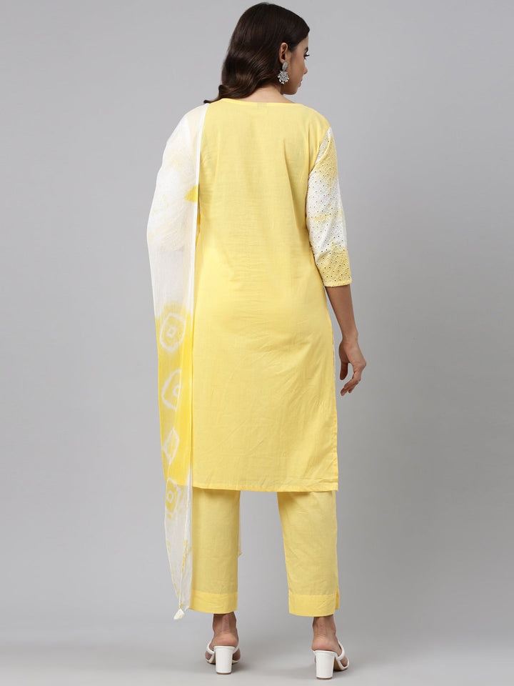 Neerus Yellow cotton solid kurta set with trouser and dupatta - side view