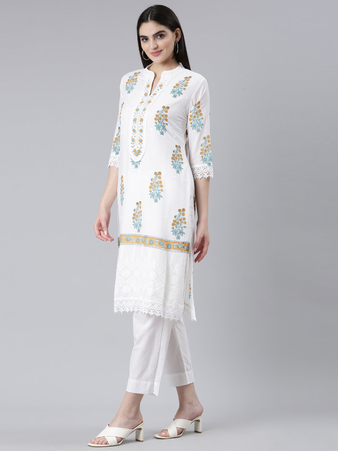 Neerus Yellow cotton printed kurta set with trouser and dupatta - back view