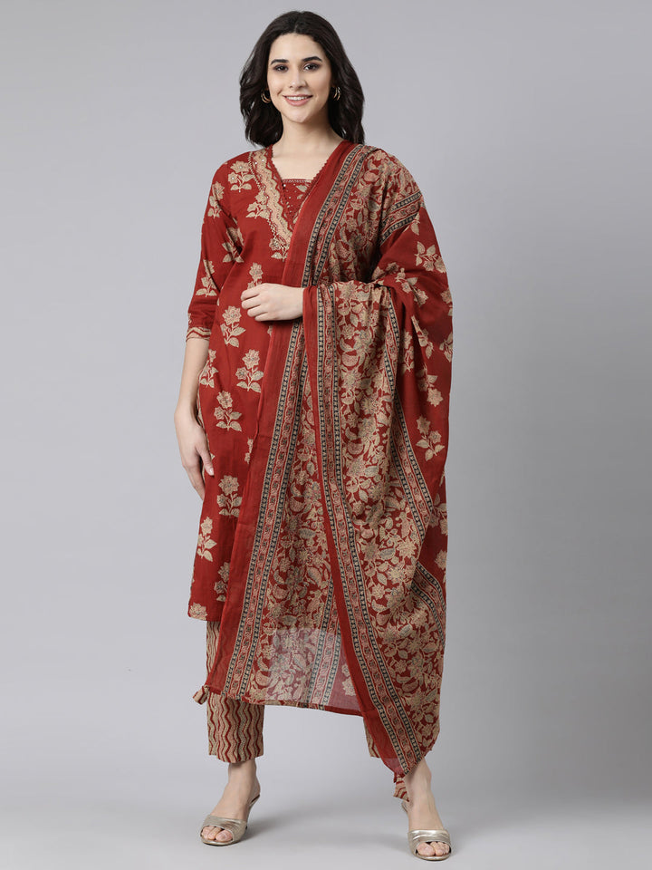 Neerus Orange printed floral suit set straight kurta with trouser and dupatta - front view