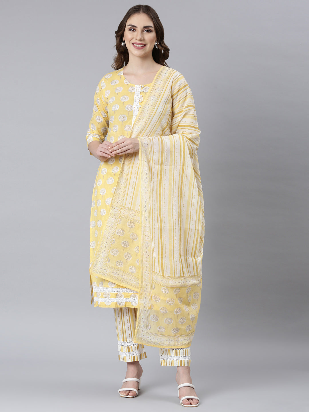Neerus Yellow cotton printed suit set panelled straight kurta with dupatta - front view