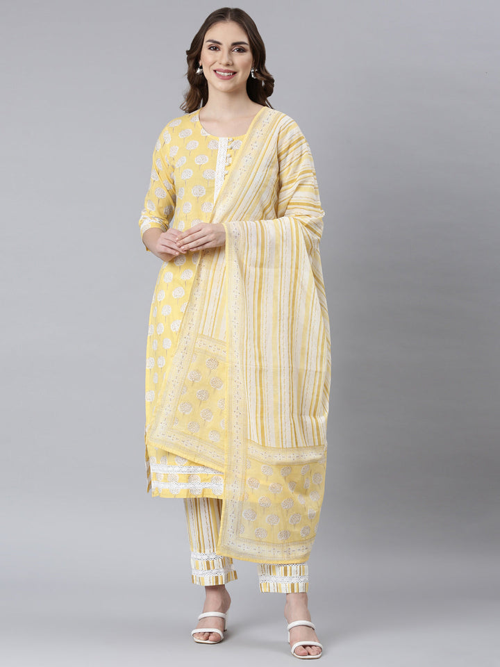 Neerus Yellow cotton printed suit set panelled straight kurta with dupatta - front view