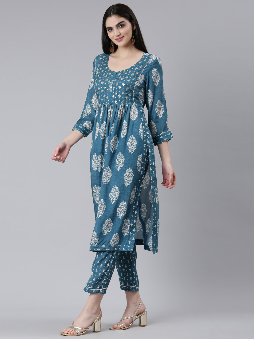 Neerus Green muslin printed kurta set - back view