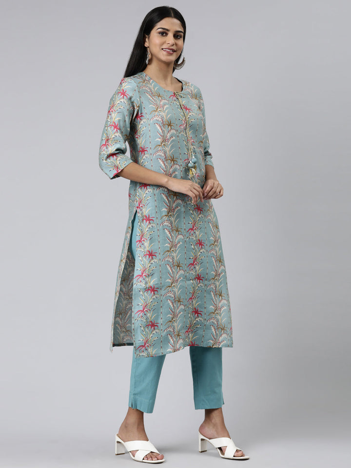 Neerus Green cotton printed kurta set with trousers - back view