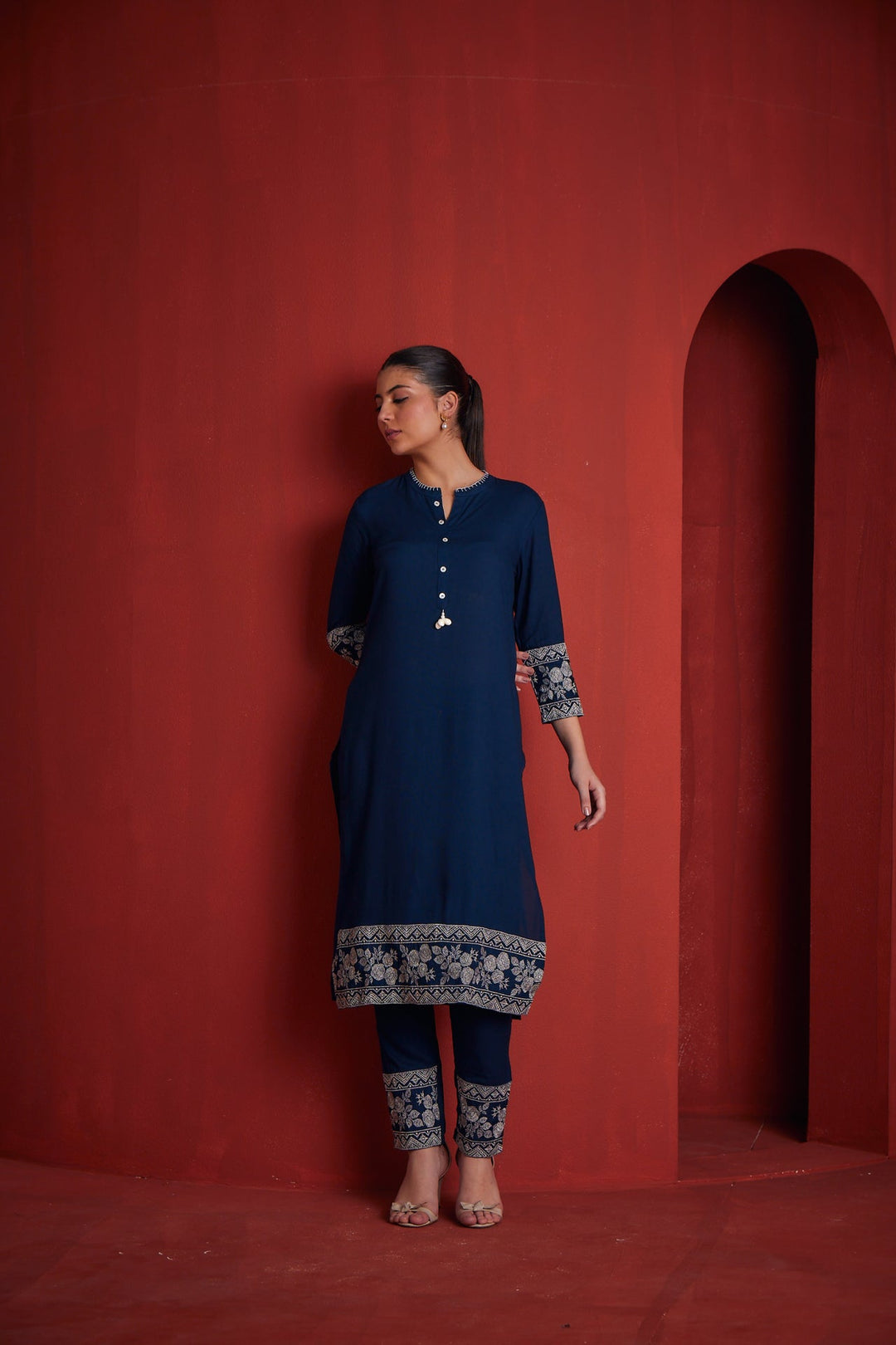 Neerus Blue solid straight kurta set with trousers - front view