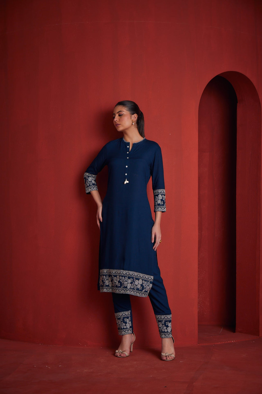 Neerus Blue solid straight kurta set with trousers - back view