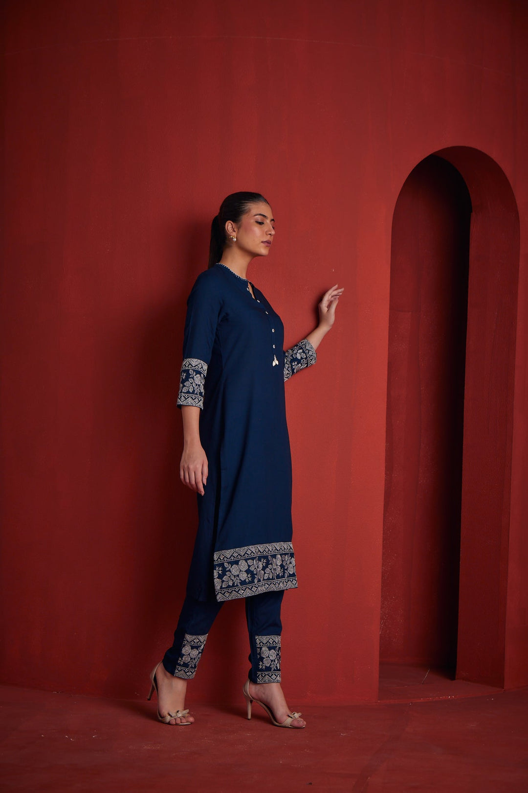 Neerus Blue solid straight kurta set with trousers - side view