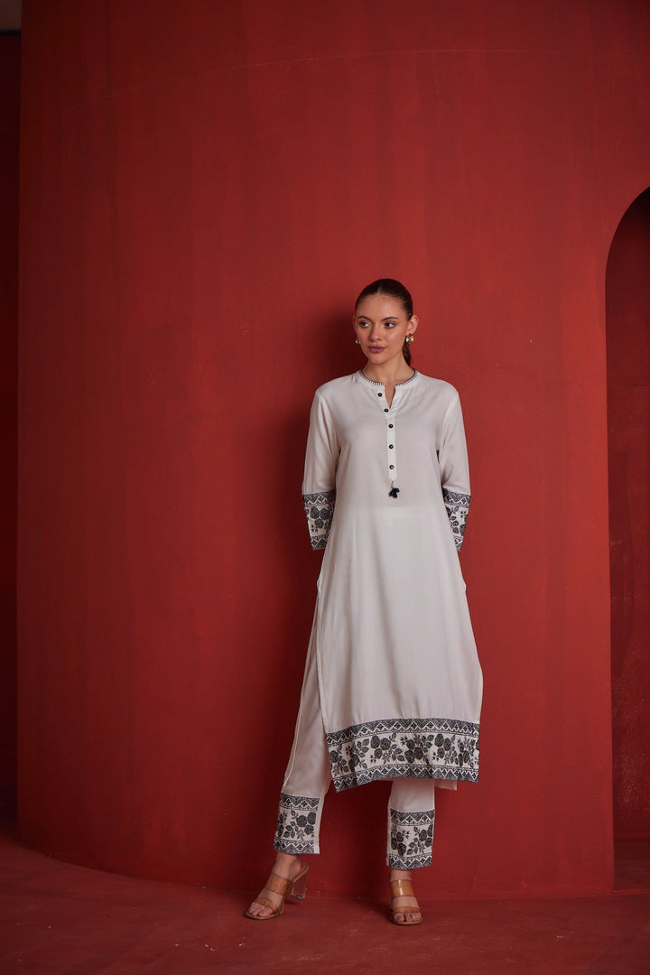 Neerus White solid straight kurta set with trouser - back view