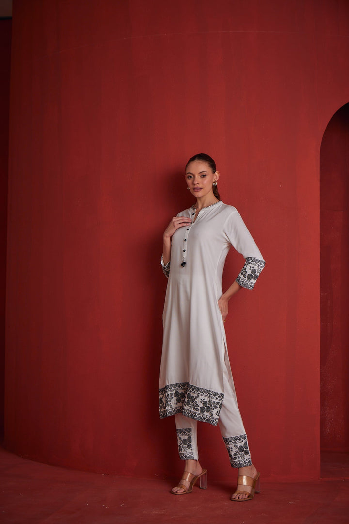Neerus White solid straight kurta set with trouser - side view