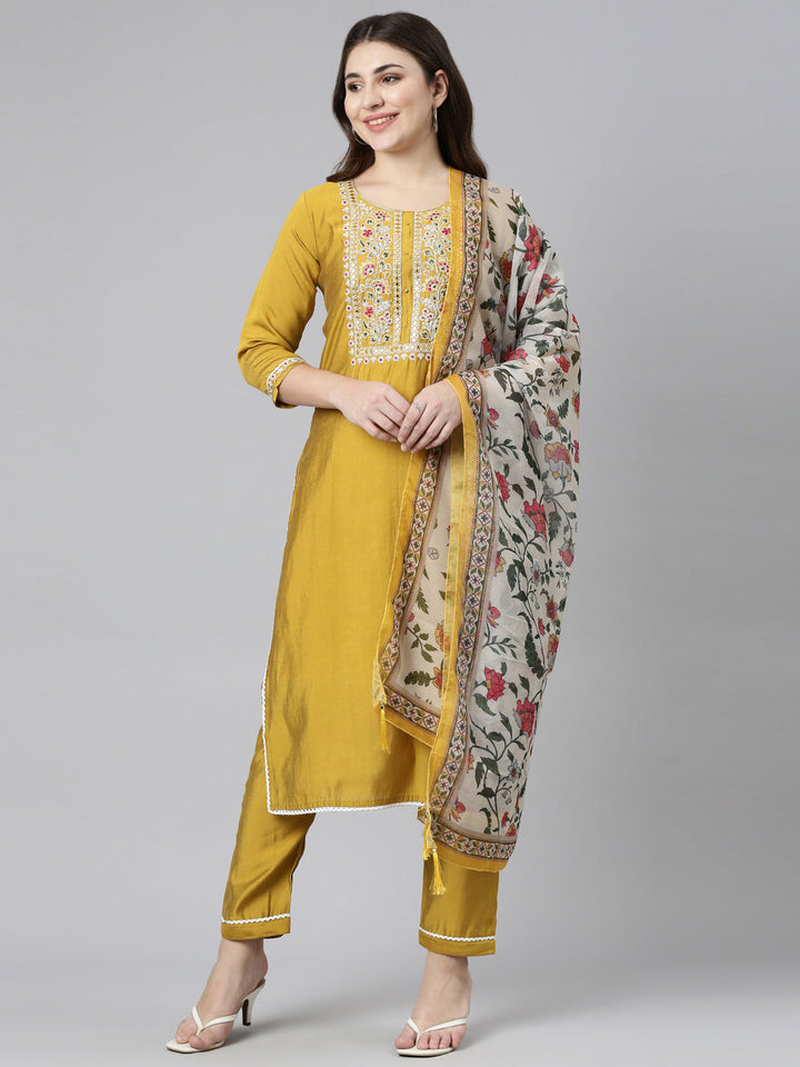 Neerus Yellow straight solid kurta set with trouser and dupatta - front view