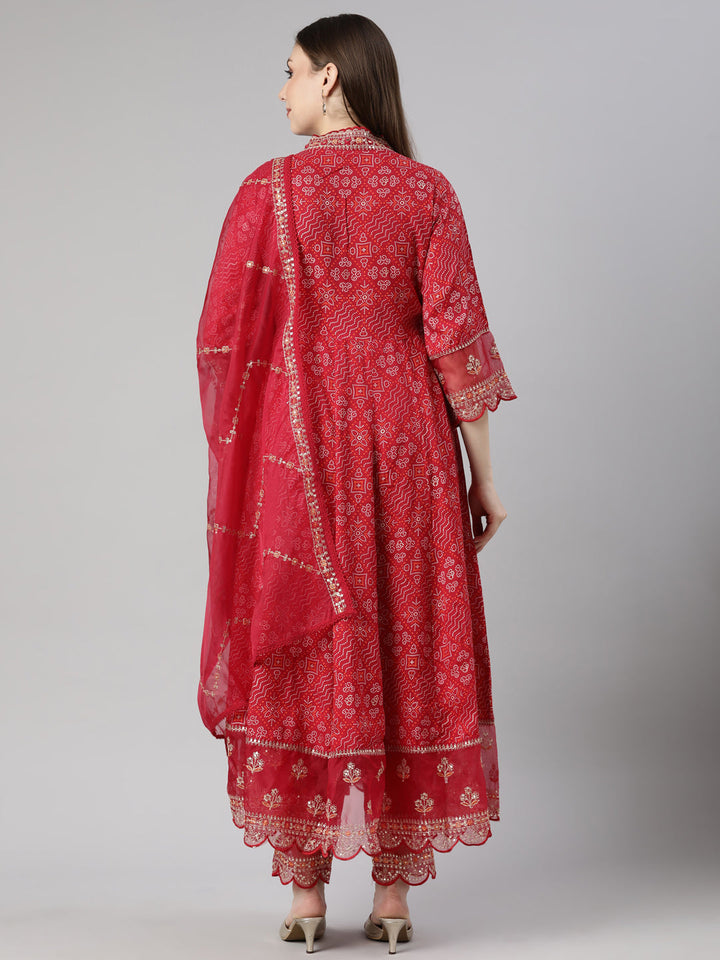 Neerus Pink Bandhani Printed Flared Suit Set - side view