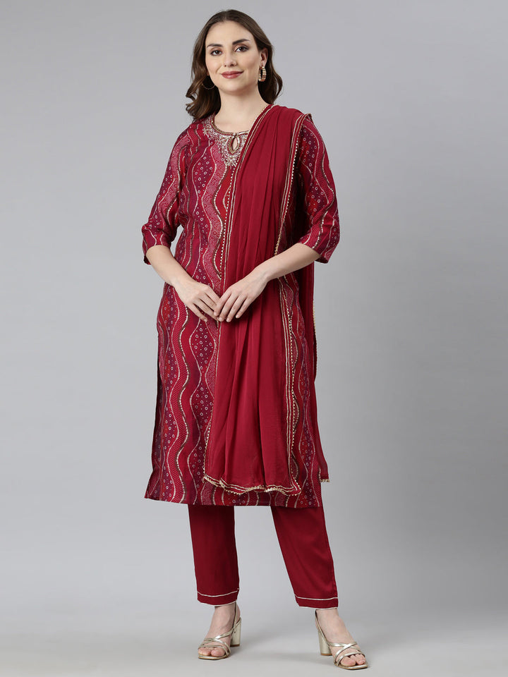 Neerus Maroon Bandhani printed suit set - front view