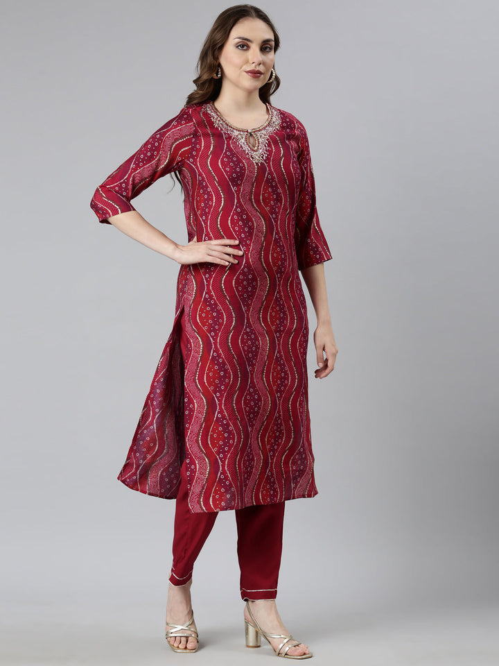 Neerus Maroon Bandhani printed suit set - back view