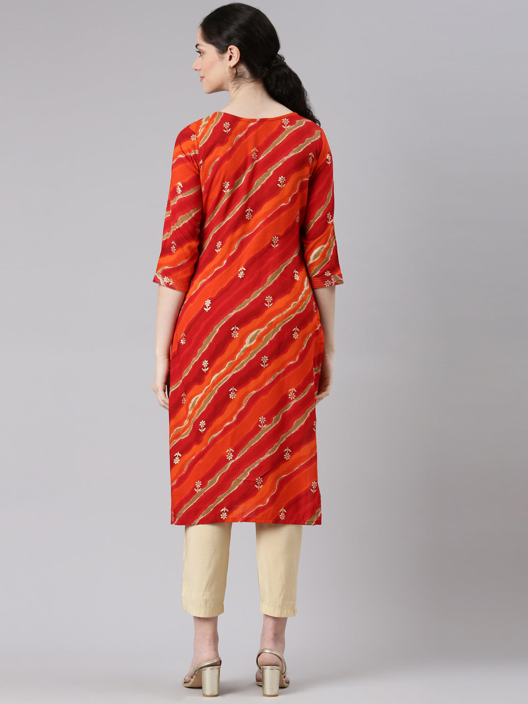Neerus Orange printed striped straight kurta - side view