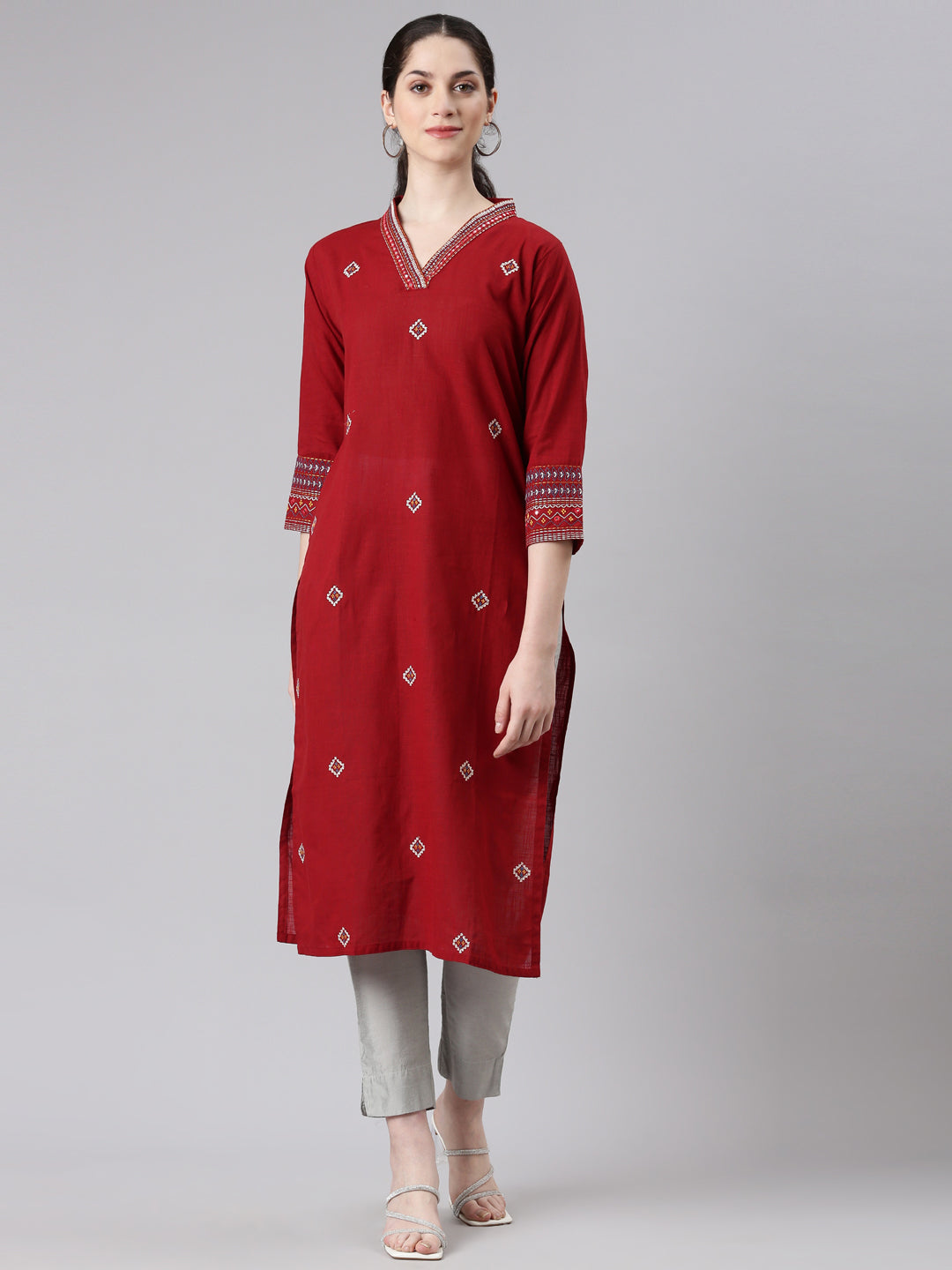 Neerus Maroon solid straight kurta - front view