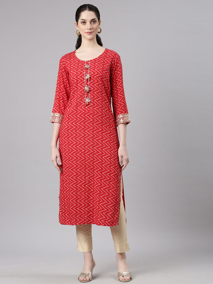 Neerus Red rayon printed straight kurti - front view