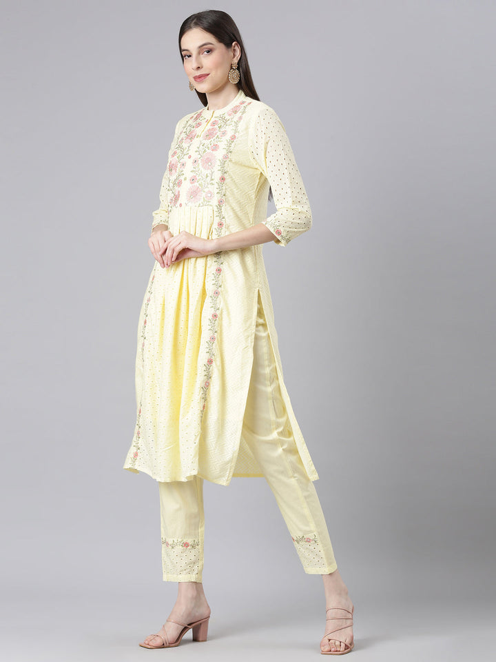 Neerus Yellow Solid Straight Kurta and Trousers With Dupatta