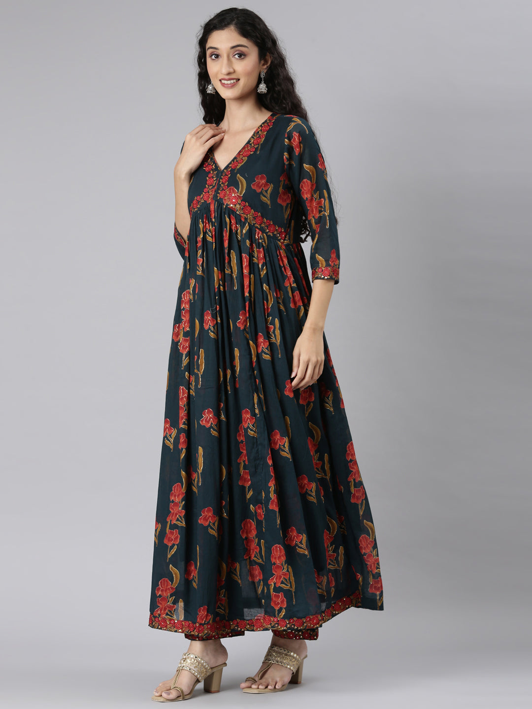 Neerus Green muslin printed kurta suit set - back view