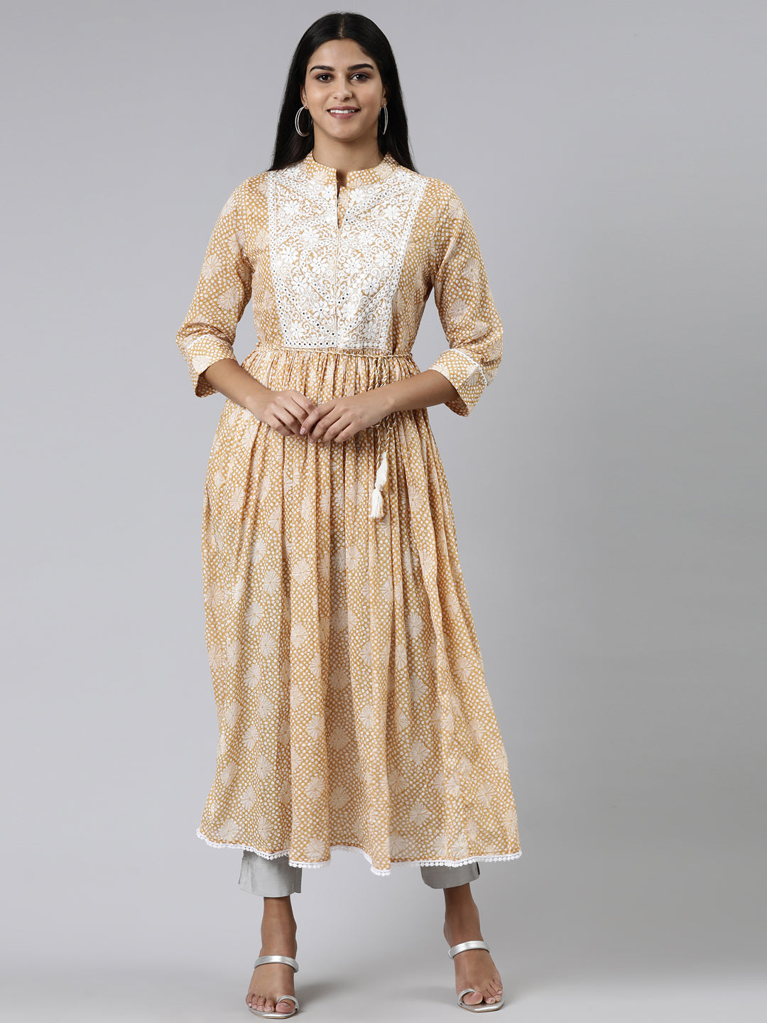 Neerus Yellow cotton printed straight kurti - front view