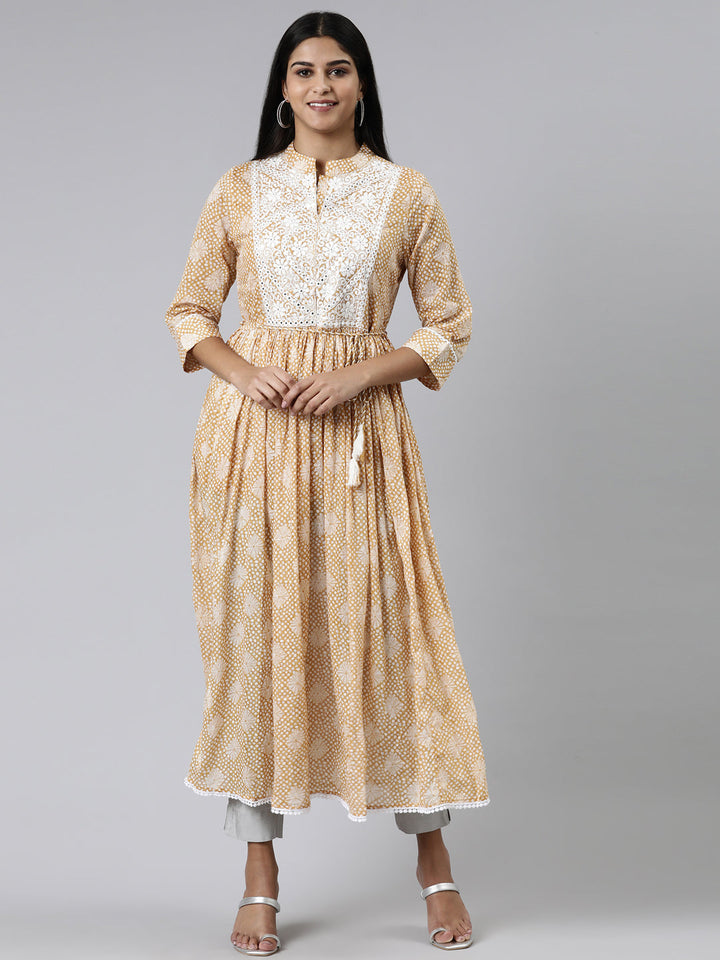 Neerus Yellow cotton printed straight kurti - front view