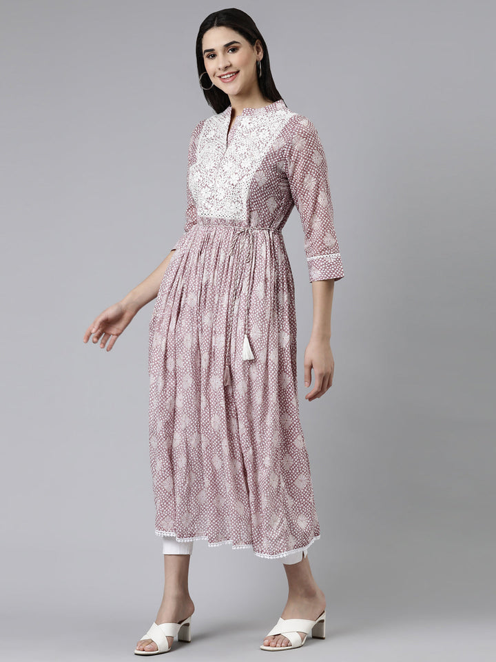 Neerus Purple cotton printed straight kurti - back view