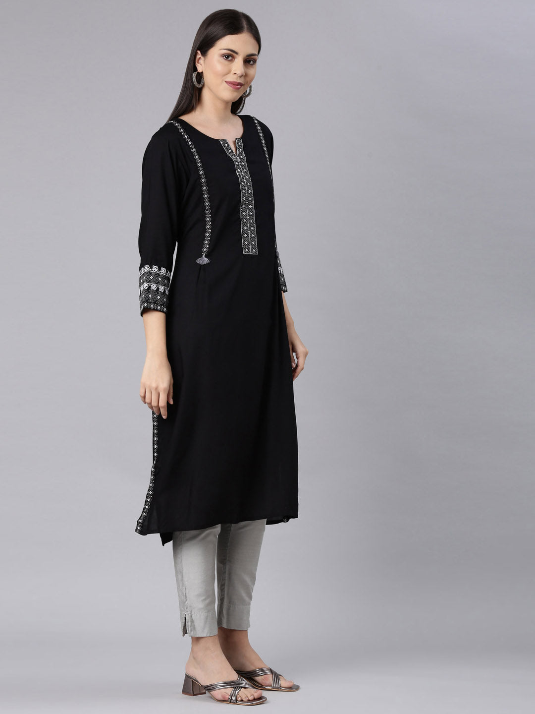 Neerus Black rayon solid straight kurti - side view