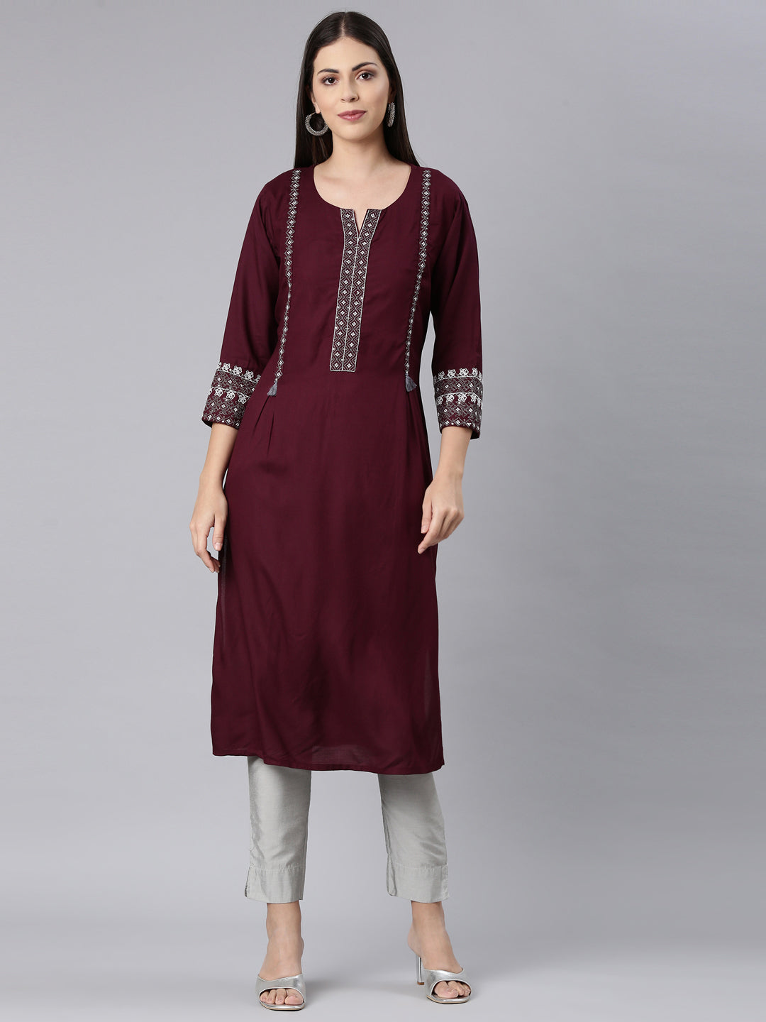 Neerus Maroon rayon solid straight kurta - front view