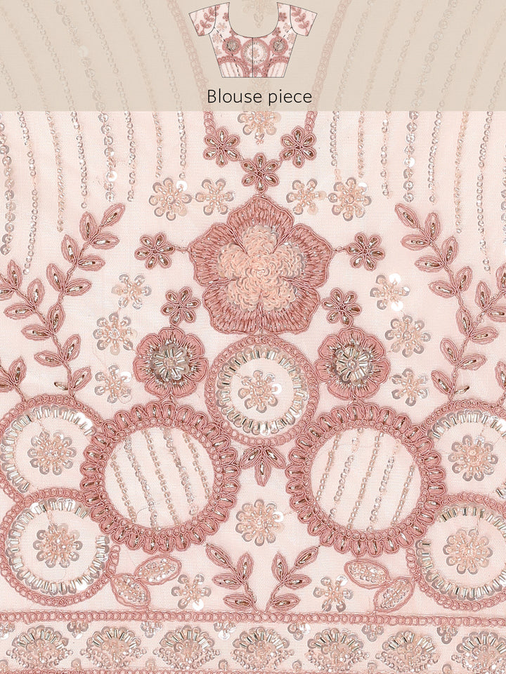 Peach net saree with pearl and sequins hand embroidery with scallop border