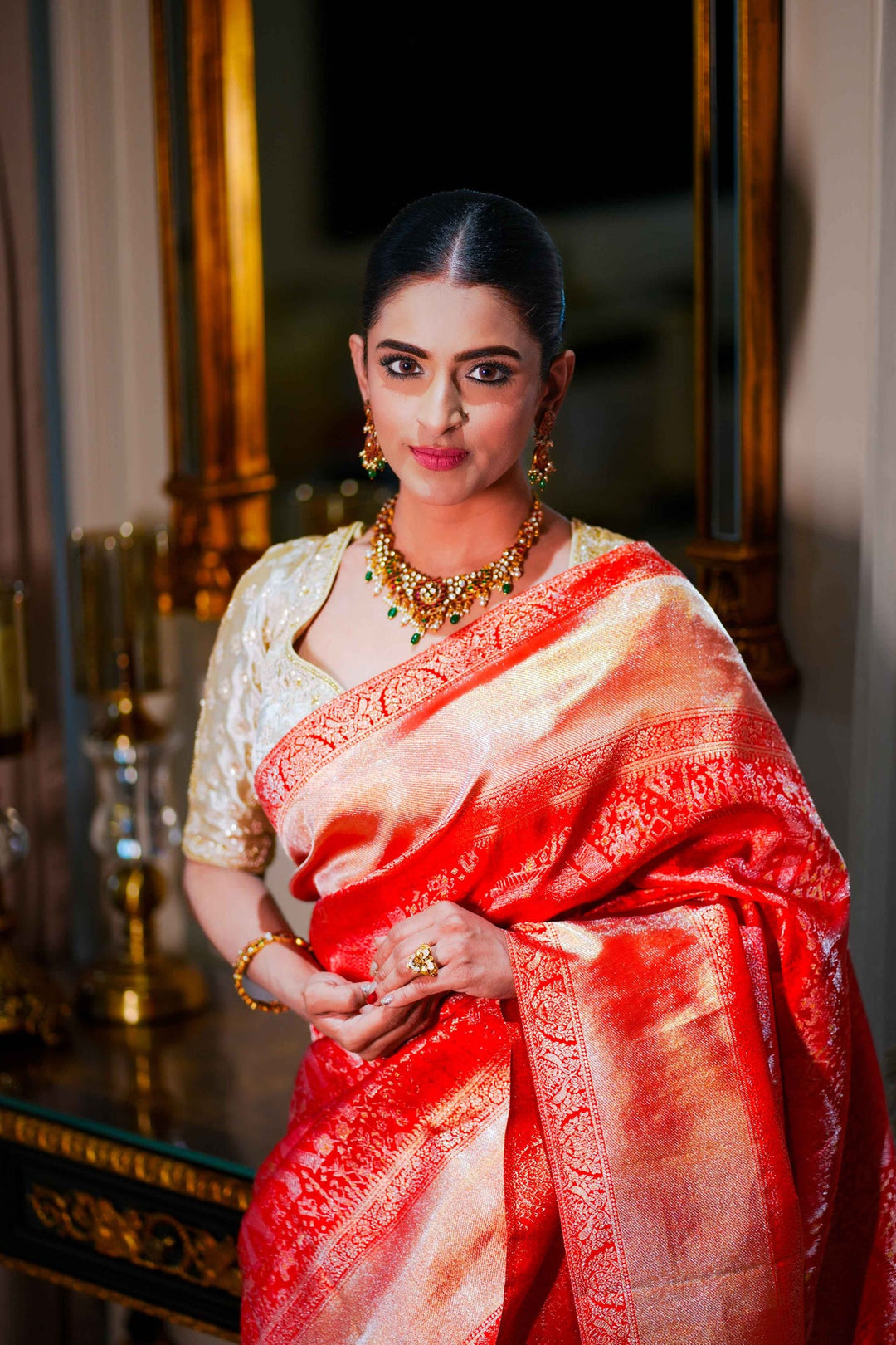 Neerus Red silk woven saree with blouse piece - back view